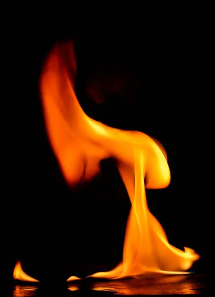 Beautiful fire flames on black background. — Stock Photo, Image