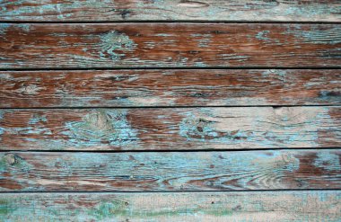 Çatlak ve boya katmanları ile eski püskü ahşap arka plan