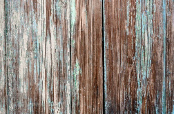 Çatlak ve boya katmanları ile eski püskü ahşap arka plan