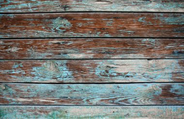 Çatlak ve boya katmanları ile eski püskü ahşap arka plan