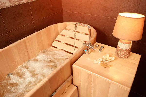 Hydro massage in a wooden bath, for relaxation and relaxation in the Spa