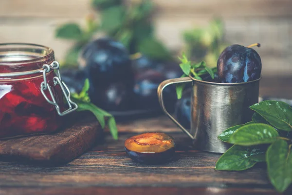 Chutney sauce made from red plum and apples. Indian cuisine. Additive to meat, rice and other dishes. Organic, healthy fruits.Toned image. Selective focus.