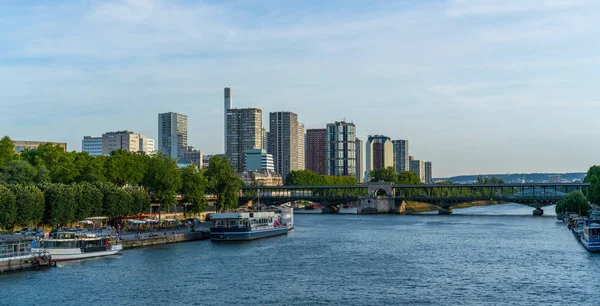 Landmark view on Seine river during the sunny day in Paris. Copy space for your text.