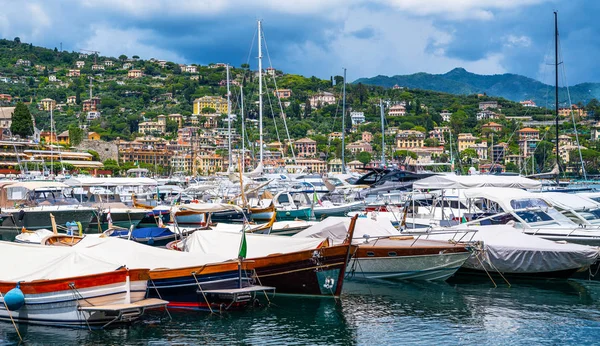 Boats near the marina of Santa Margherita Ligure, which is popular tourist destination. Santa Margherita Ligure town in summer. View from the bay. Liguria, Italy