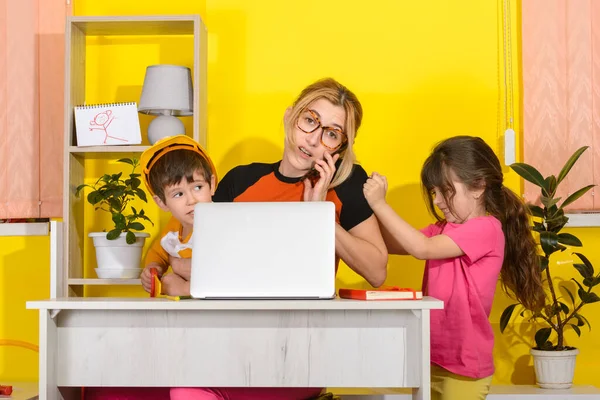 Mum work from Home. Upset kids make noise and disturb mom at work. Busy Parent. Problems Solving. Family Relationship. Remote work, distance job
