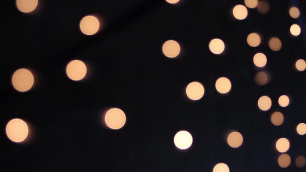 Garland in de defocus. — Stockvideo