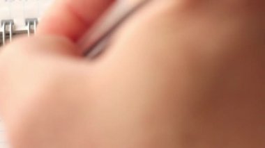 a male hand writes with a pen in a notebook and makes a double emphasis: gender equality .. Extreme close-up, Full HD,