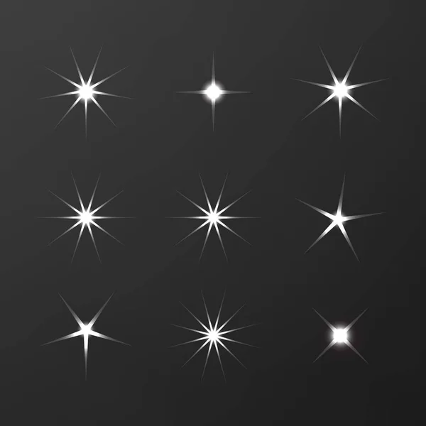 Parıltı simgesi seti. Yıldız elementi Parıldayan ışıklar vektörü — Stok Vektör