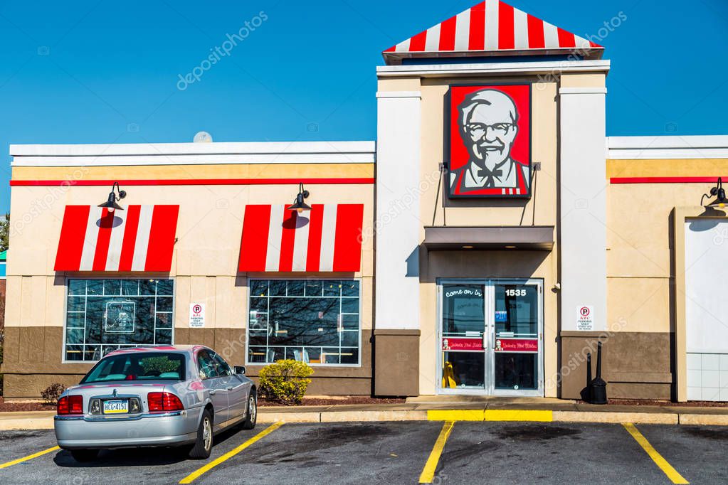 Lancaster, PA, USA - February 19, 2017: A KFC Restaurant, previously known as Kentucky Fried Chicken, is an American fast food chain with over 20,000 locations that specializes in fried chicken.