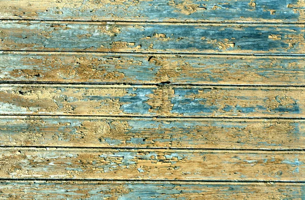 Parede de casa de madeira desgastada laranja — Fotografia de Stock