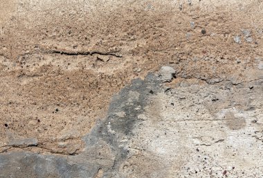 Çimento duvar doku yıpranmış.