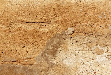 Çimento duvar doku yıpranmış.