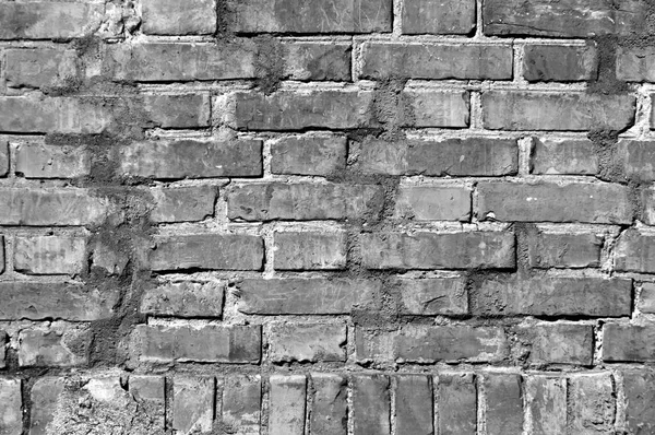 Grungy black and white brick wall texture. — Stock Photo, Image