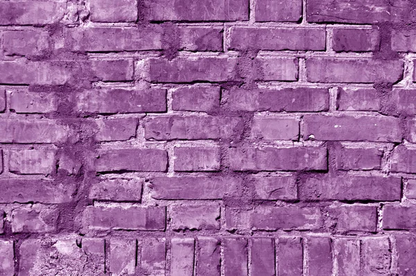 Grungy magenta tonificado textura da parede de tijolo . — Fotografia de Stock