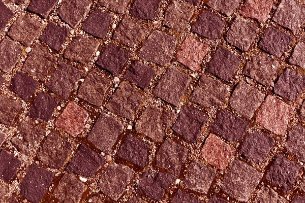 Красная тонированная текстура каменного покрытия . — стоковое фото