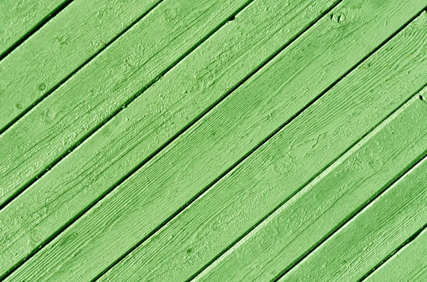 Green color wood house wall surface.