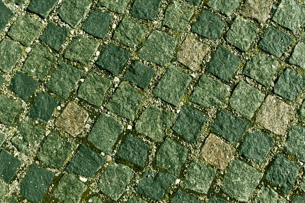 Green toned stone pavement texture. — Stock Photo, Image