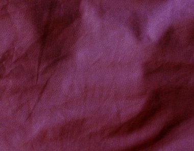 Kırmızı renk tekstil kumaş yüzeyi.