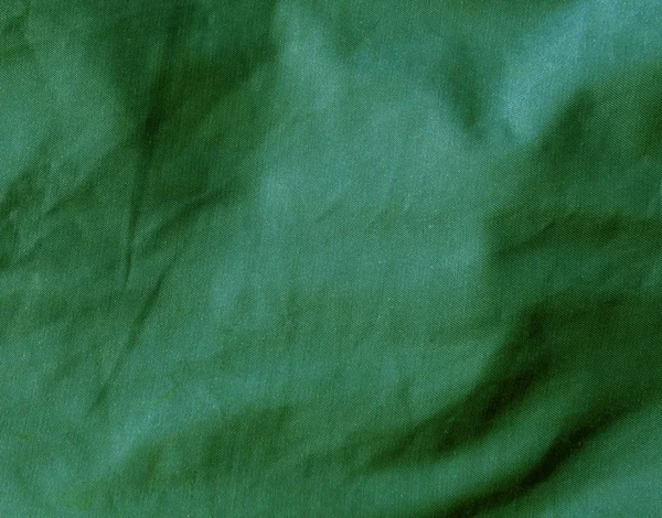 Surface en tissu textile de couleur verte . — Photo