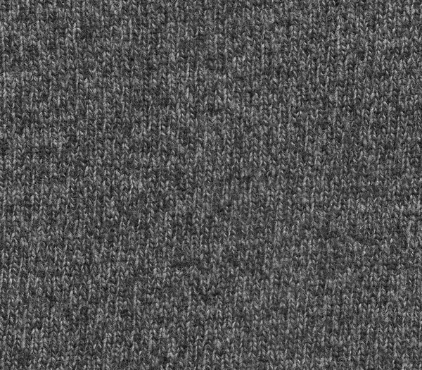 Šedá barva pletení tkaniny textury. — Stock fotografie
