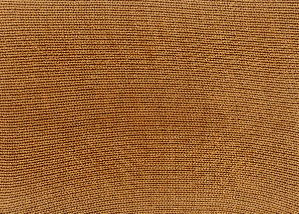 Orange knitted material texture. — Stock Photo, Image