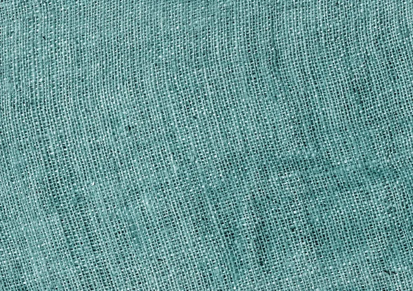 Textura de tela de saco hessiano de color cian . — Foto de Stock