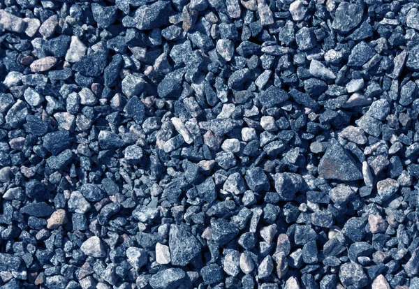 Pile di pietre di ghiaia blu tonica . — Foto Stock