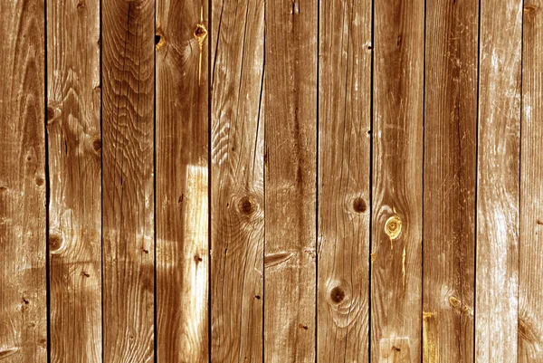 Weathered orange wood wall texture. Royalty Free Stock Images