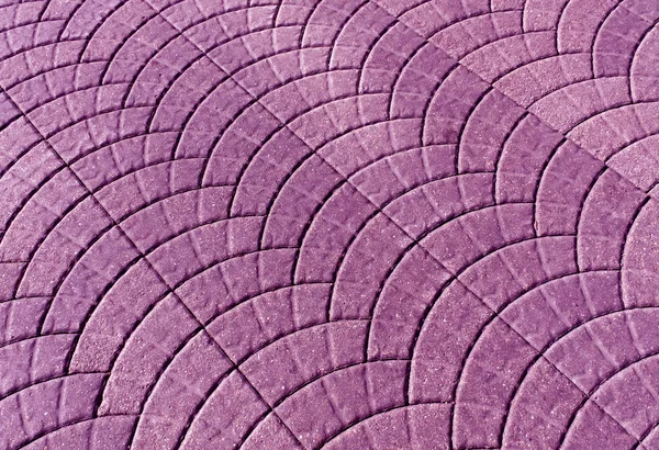 purple toned pavement surface.