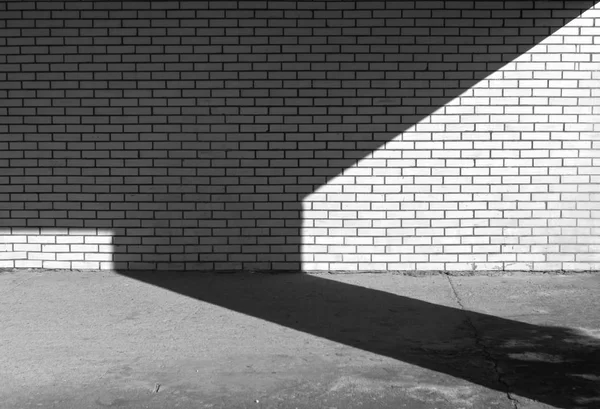 Textura de parede de tijolo preto e branco e sombra . — Fotografia de Stock