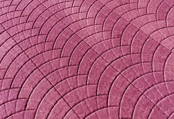 Pink color pavement surface.