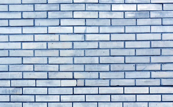 Blue toned brick wall texture