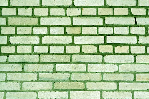 Zelená barva výstřední cihlová zeď vzor. — Stock fotografie