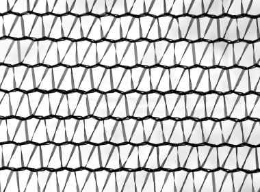 Siyah ve beyaz plastik net çit yüzey