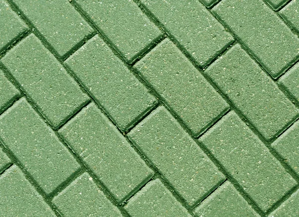 Parede de paralelepípedo de cor verde close-up — Fotografia de Stock
