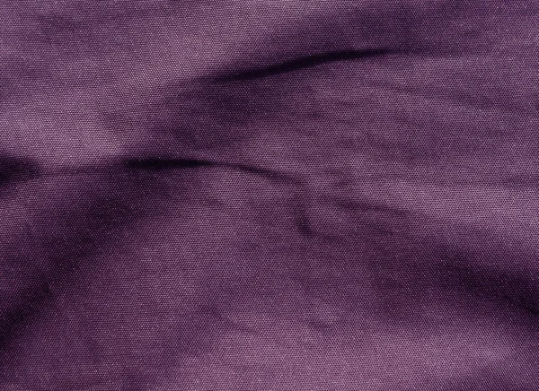 Текстура ткани фиолетового цвета — стоковое фото