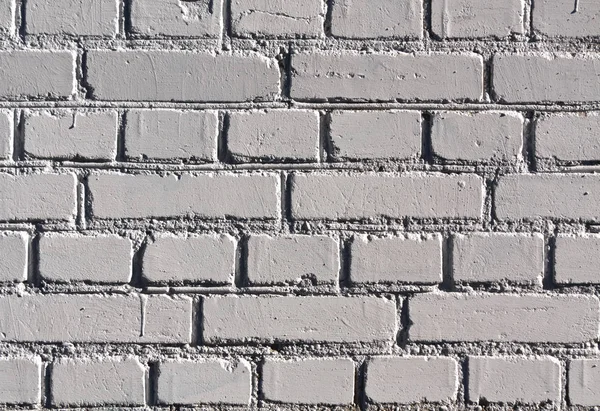 Weathered gray color brick wall pattern.