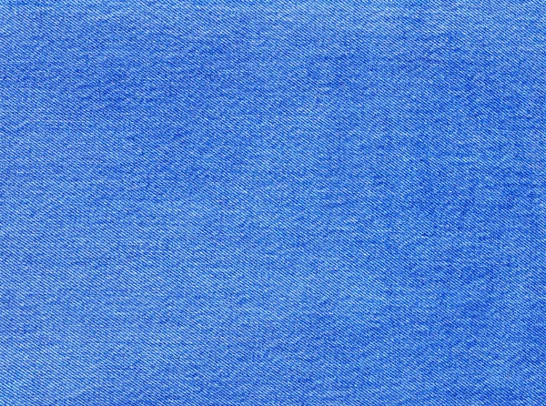 Текстура синей джинсовой ткани . — стоковое фото