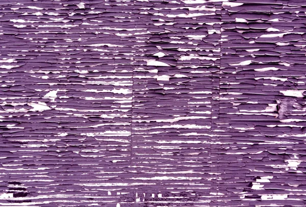 Pintura resistida violeta na textura da parede de madeira . — Fotografia de Stock