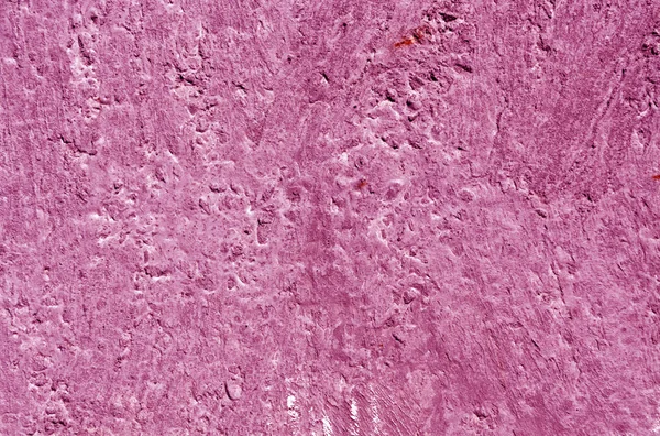 ピンク色の風化したセメントの壁のパターン. — ストック写真