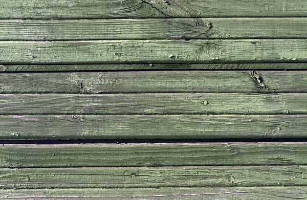 Groene verweerde houten muur textuur. — Stockfoto