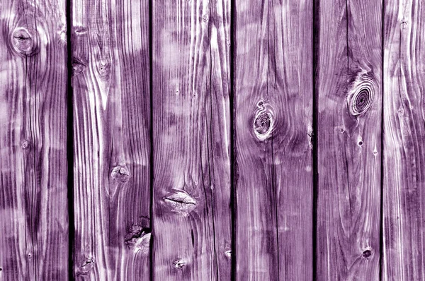Clôture en bois teinté violet motif . — Photo