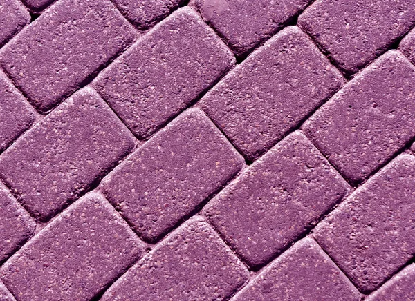 Superficie del pavimento adoquinado de color púrpura . — Foto de Stock