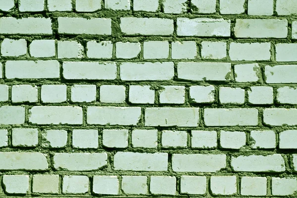 グリーン トーンの荒いレンガ壁パターン. — ストック写真