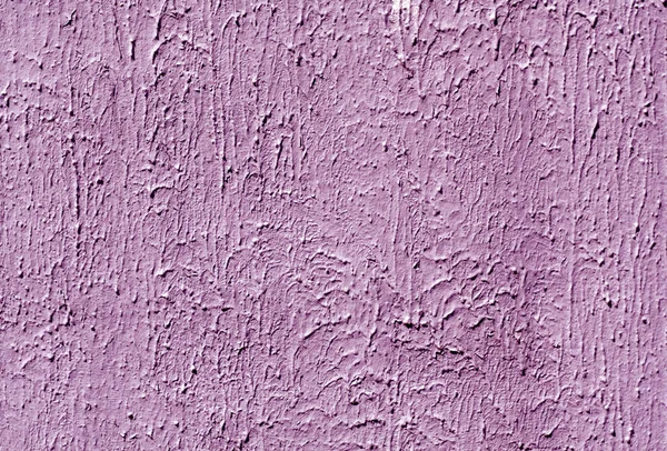 purple color plaster wall pattern.