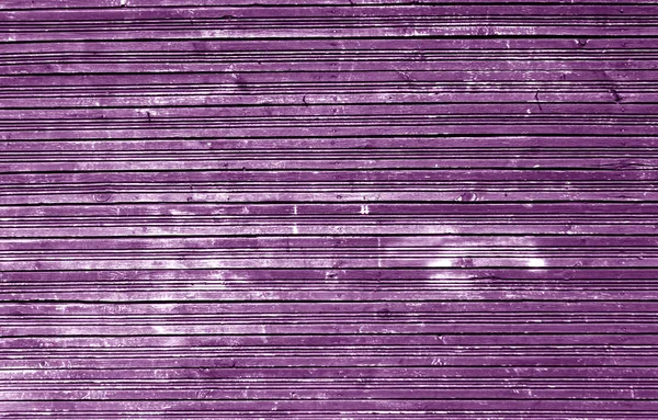 Grungy verweerde houten muur paarse kleur. — Stockfoto