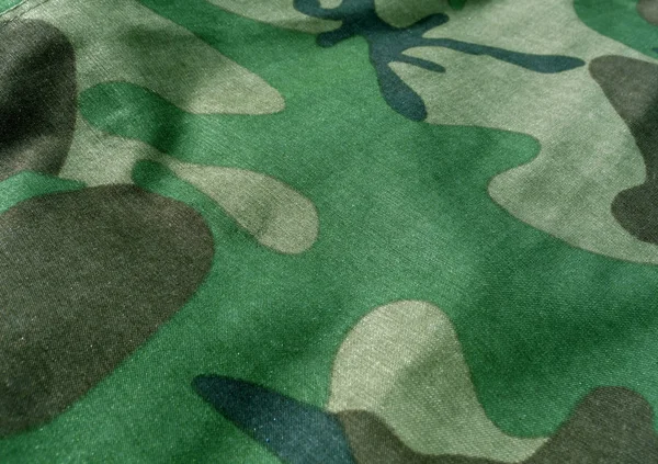 Camouflage Textil einheitliche Nahaufnahme mit Verwischungseffekt. — Stockfoto