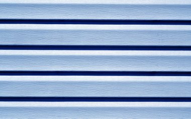 Blue color plastic panel wall pattern. clipart