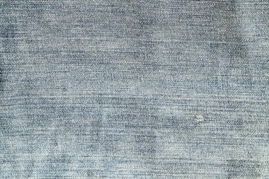 Mavi renk kot doku yıpranmış.