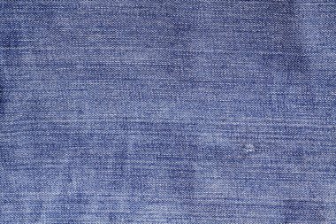 Mavi renk kot doku yıpranmış.